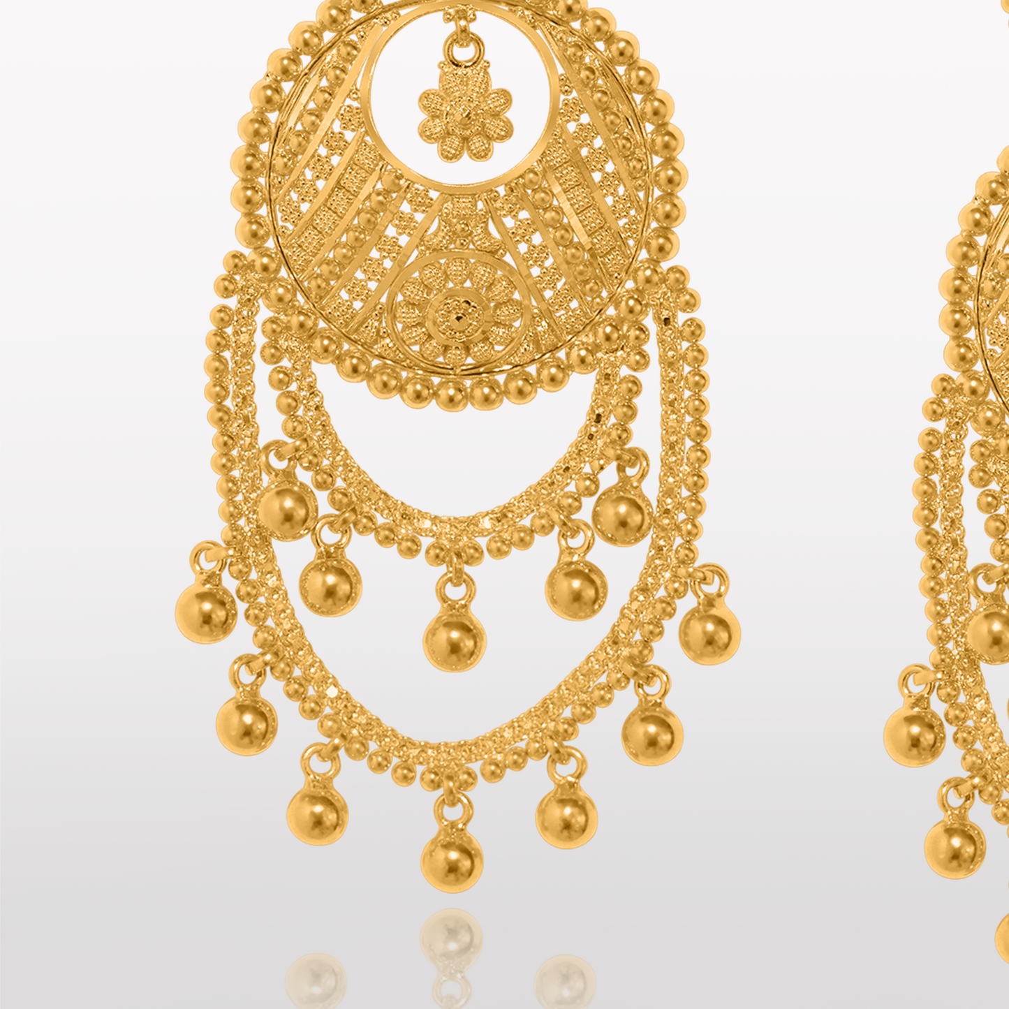<img src="sahar-heritage-chandbali-earrings.jpg" alt="Sahar Heritage 22k Gold Filligree Chandbali Drop Earrings - a close-up view of exquisitely designed chandbali drop earrings in 22k gold, featuring intricate filligree work and a stunning silhouette that exudes elegance and sophistication."/>