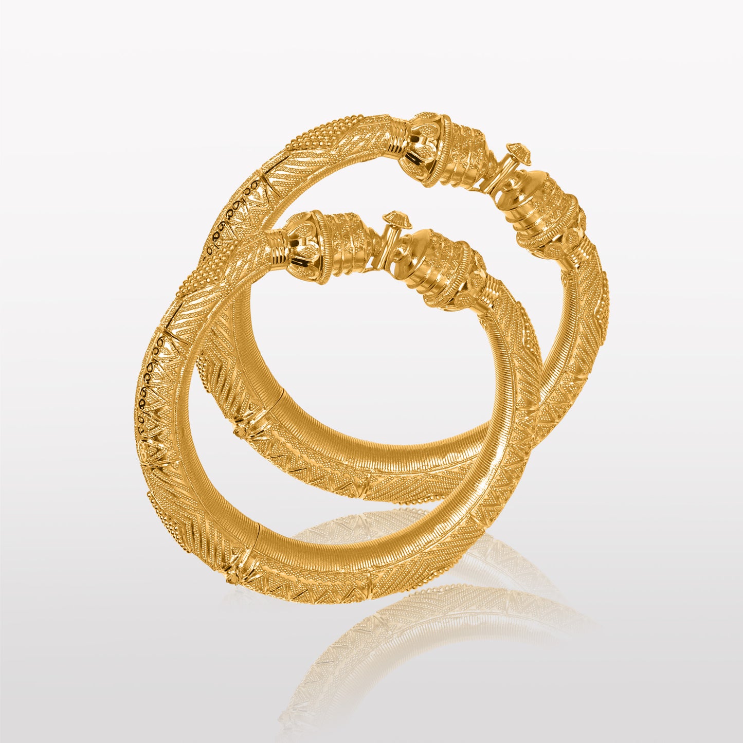 
                  
                    <img src="kimaya-kada-22k-gold.jpg" alt="Kimaya Women's Pair of Kada in 22k Gold - a beautiful image showcasing a pair of traditional Indian bangles, known as kadas, made of 22k gold and featuring intricate designs and a stunning, glossy finish."/>
                  
                