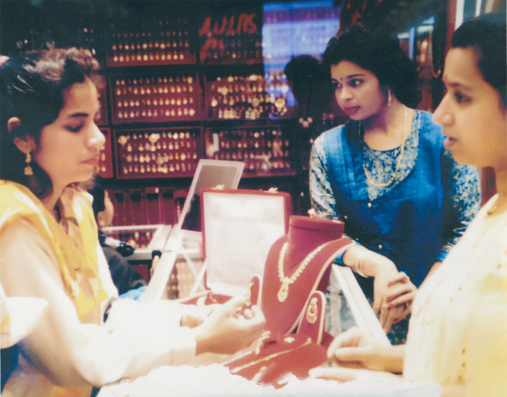 Seema Nanda and a client negotiating a sale in early 90's