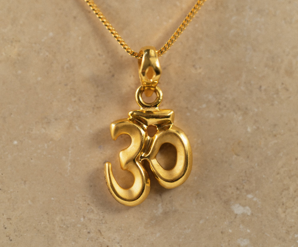 Gold om pendant price on sale